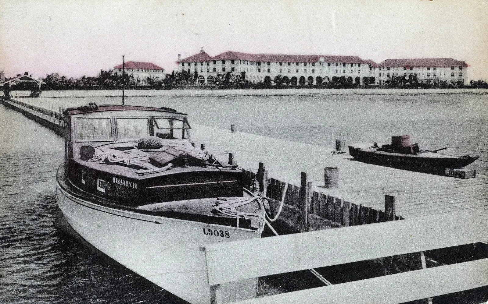 Post card of the Casa Marina with the fishing boat Miraamy II at the docks.. Leonard Hicks, Manager. Monroe County Library Collection.