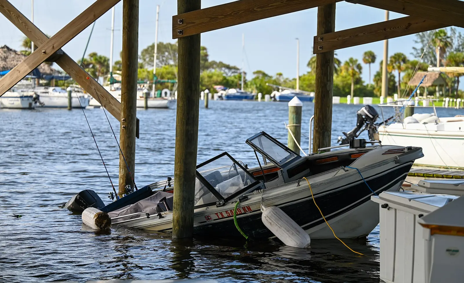 A flooded boat is docked at the Manatee Cove Marina during the early morning hours following Hurricane Milton’s landfall at Patrick Space Force Base, Florida, October 10, 2024....