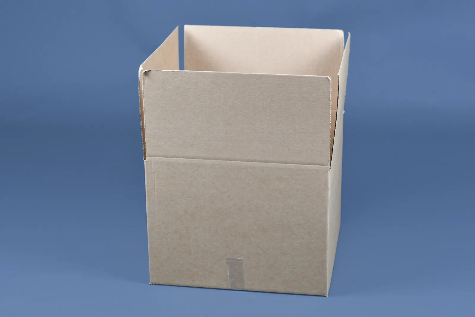 An open cardboard moving box