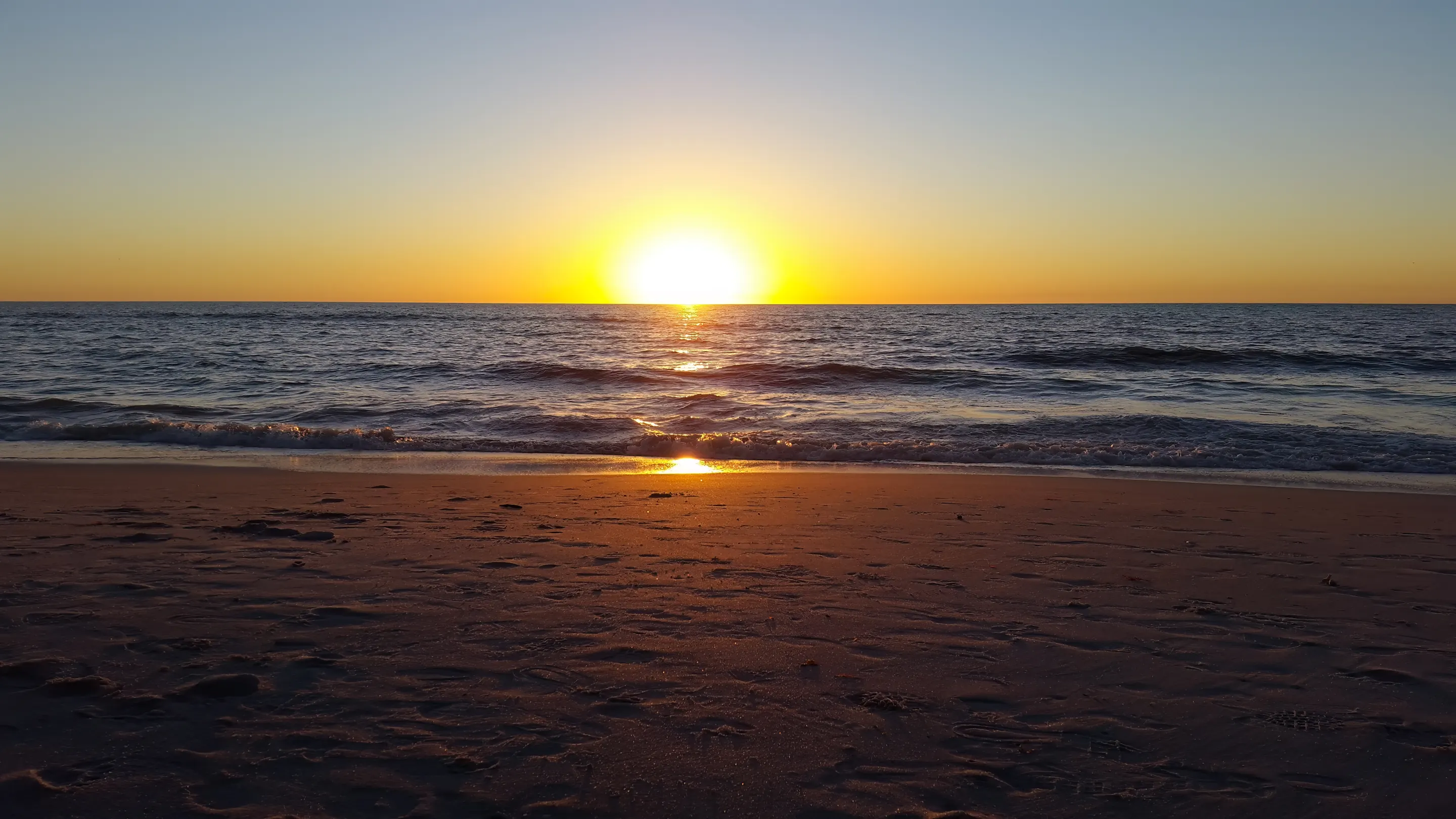 Sunset over the Gulf at Naples Beach, Florida