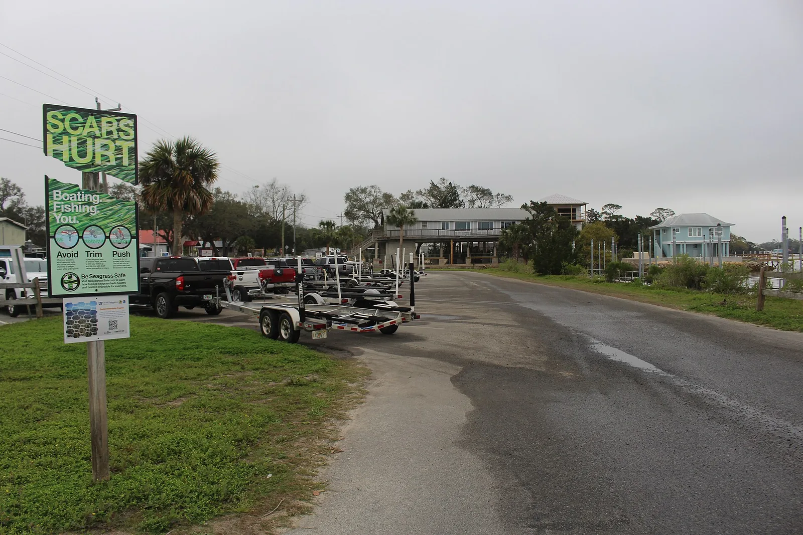 A Florida boat-ramp parking lot looking east from the ramp